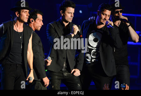 Frankfurt, Germany. 17th May, 2014. The members of the US-band New Kids On The Block Joey McIntyre (L-R), Danny Wood, Jordan Knight, Jonathan Knight and Donnie Wahlberg perform on stage during their first concert on their Germany tour in Frankfurt, Germany, 17 May 2014. The former boy-band was popular amongst teenagers in the early 1990s. Photo: Arne Dedert/dpa/Alamy Live News Stock Photo