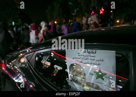 Cairo, Egypt. 18th May, 2014. A poster of Egypt presidential candidate Abdel-Fattah el-Sissi is seen inside a car parking by a campaign in Cairo, Egypt, May 18, 2014. Egyptians gathered here on Sunday to back Sisi's running for president over the upcoming presidential election on May 26th and 27th. © Cui Xinyu/Xinhua/Alamy Live News Stock Photo