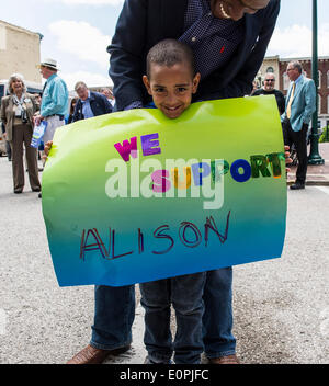 May 18, 2014 - Georgetown, Kentucky, U.S. -  A young man holds a hand-made sign in support of Alison Lundergan Grimes.  Mrs. Grimes, Kentucky's Secretary of State, is the favorite to win the Democratic Senate primary on Tuesday, and to take on Senator Mitch McConnell in the November election.(Credit Image: © Brian Cahn/ZUMAPRESS.com) Stock Photo