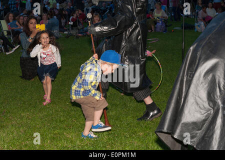 Wye Valley, Chepstow, UK. 18th May 2014. 9pm 19th May 2014 Chepstow. 2014 Wye Valley Festival Finale including street theatre, choirs and fireworks. Credit:  David Broadbent/Alamy Live News