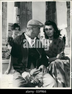 Nov. 11, 1956 - Sophia Loren Filming - At The Acropolis. Her Double Looks On: The Athens Acropolis is the setting for the exterior shots of the new film ''A Boy on a Dolphin'' which stars Italian actress Sophia Loren. Photo shows Sophia Loren with director Jean Negulesco during a short rest between filming (Sophia's Double can be seated behind) Stock Photo
