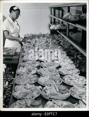 Feb. 02, 1957 - The Pentagon, nerve Center Of Defense: Approximately 675 persons are required to operate the pentagon's two restaurants, six cafeterias, nine beverage bars and outdoor snak bar. a kitchen worker is shown prepare salads for a noonday meal. Stock Photo
