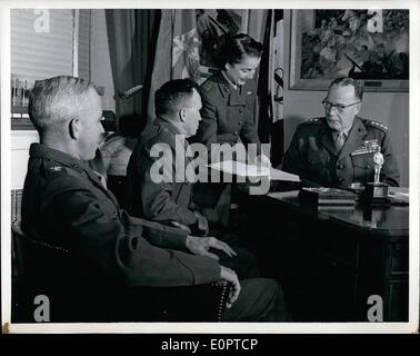 Feb. 02, 1957 - The Pentagon, Nerve Center of Defense: Although the Headquarters of the Marine Corps is physically in a large annex building near the Pentagon, Their activities are integral part of the operations of the huge defense structure. Gen. Randolph McPate, Commandant of the Marine Corps, Right, Confers with a group of officers during a staff meeting. Stock Photo