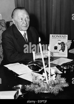 Dr. Konrad Adenauer shows off a present Stock Photo