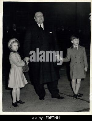 Feb. 21, 1957 - The Queen And The Duke Of Edinburgh Return To London After Their State Visit To Portugal: Photo Shows Mr. Jeffs, Commandant of the London Airport, holds the hands of Prince Charles and Princess Anne as they not wait for he plane with the Queen and the Duke on board to come to a standstill. Stock Photo