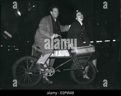 Jan. 01, 1957 - Photo shows Famous German sen-star O.W. Fischer O.W. Fischer mounted a bicycle and had a ride with the stew Stock Photo