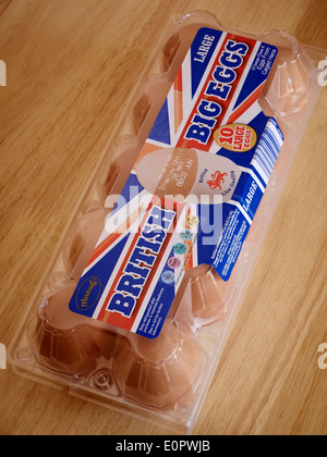 Plastic carton holding large brown British eggs Stock Photo