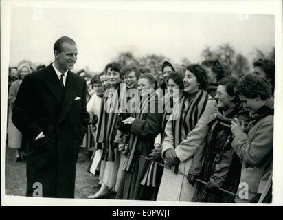 Mar. 03, 1957 - Prince Philip Visits Cheltenham. Greeting from the Girl Student: Prince Philip the Duke of Edinburgh yesterday paid a visit to St. Paul's College, Cheltenham, one of the Church. Training Schools. Picture Shows: Girls of St. Mary's College greet the Duke of Edinburgh as he leaves the Playing fields of St. Paul's after planting a tree. Stock Photo