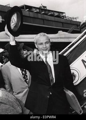 Jan. 01, 1957 - Berlin, Germany - Legendary actor MARLON BRANDO has died at age 80 of unknown causes in Los Angeles. His long acting career included movies such as 'A Streetcar Named Desire,' 'Apocalypse Now,' the X-rated 'Last Tango in Paris' and (pictured) his infamous 'The Godfather.' Pictured arriving in Berlin. Stock Photo