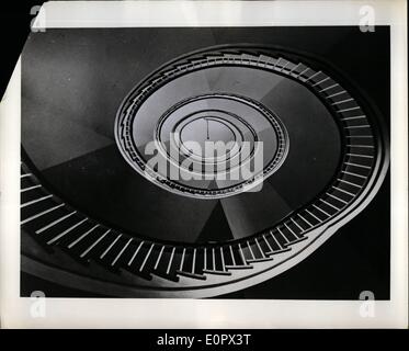 Apr. 04, 1957 - The Customer Can Be Wrong. ''The customer is always right,'' a famed merchant is claimed to have said. But those entering Binn's Store, Middlesborough, England, can be pardoned if they look up and are wrong. There is a new elliptical staircase that spirals upward for five flights with no visible support. Made of strongly reinforced concrete, it was cast in position flight by flight. Picture Shows: Looking up the store's stairs. Stock Photo