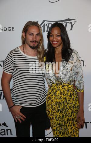 Actress Zoe Saldana and husband Marco Perego attend the Relativity 10th anniversary lunch during the 67th Cannes International Film Festival at Hotel Du Cap in Cap d'Antibes, France, on 18 May 2014. Photo: Hubert Boesl NO WIRE SERVICE Stock Photo