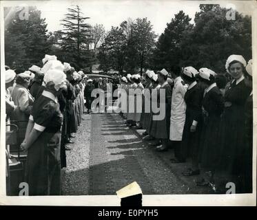 May 05, 1957 - Princess Alexandra opens new department at Royal Portsmouth Hospital: H.R.H. Princess Alexandra of Kent performed the ceremony of opening the new outpatients' department of the Royal Portsmouth Hospital. Photo shows Princess Alexandra walks between the Nurses' Guard of Honor - on arrival. Stock Photo