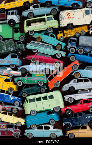 Old playworn Dinky, Matchbox Lesney toy cars, buses, motorbikes pattern Stock Photo