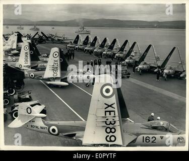 May 05, 1957 - Queen's Visit To The Fleet. On Board The Ark Royal: H.M. The Queen and The Duke of Edinburgh on the last day of their visit to the Home Fleet - went aboard the aircraft carrier, Ark Royal today, where they saw the launch of 8 Seahawks, a major launch of aircraft, and aircraft carrying ot Rocket projectile, straffing and Depth charge attacks, followed by recovery of aircraft. Photo Shows: General view aboard the Ark Royal today, as H.M. The Queen drives along the flight deck inspecting Seahawks.