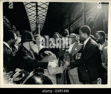 Jun. 06, 1957 - Enthusiastic welcome when prime minister of Ghana arrives in London. Dr. Kwame Nkrumah, the prime minister of Ghana, who is to attended the commonwealth prime minister conference in London, arrived in London this evening from Liverpool. photo shows Dr. Kwame Nkrumah was given an enthusiastic welcome when he arrived at Euston the evening. and police are seen as they make a passage for his as he went to his car. Dr. Nkrumah is seen in center of picture - full face. Stock Photo