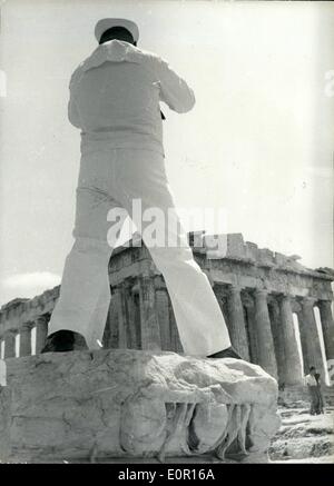 Sep. 09, 1957 - USA 6th at Phaleron Bay: Units of USA 6th Fleet have called at Phaleron Bay on a visit. Photo shows an USA sailor of the visiting fleet shooting the Parthenon on the Acropolis. A nice souvenir to carry back home. Stock Photo