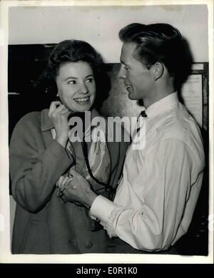 Aug. 26, 1957 - Ruby Murray's Husband says ''I'M the Boss''. Bernard Burgess, members of ''The Four Jones Boys'', who recently married singing star Ruby Murray, said yesterday ''in Future Y will take all the decisions regarding Ruby's career and life' Photo shows Yesterday's picture of Ruby Murray and her husband. Stock Photo