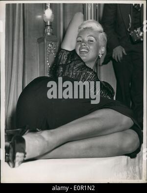 Sep. 09, 1957 - Jayne Mansfield arrives in London on  visit to Britain: Miss Jayne Mansfield, the Hollywood platinum blonde actress, arrived in London today. She is to attends the premiere of her film ''OH' for a man'' at the Carlton tomorrow night. Photo shows Jayne Mansfield release during a reception held at the Dorchester hotel this evening. Stock Photo