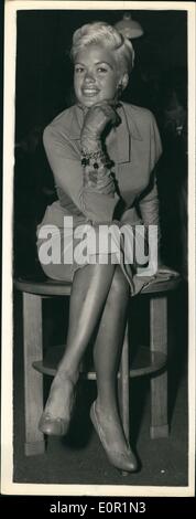 Sep. 09, 1957 - Jayne Mansfield arrives: Hollywood film star Jayne Mansfield arrived in London Airport today, She is to attend tomorrow's premiere of her film ''Oh! for a Man!'' Photo shows Hayne ''Ansfield seen during the press conference at London Airport after her arrival. Stock Photo