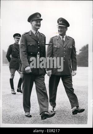 Sep. 09, 1957 - General Speidel Visits Sandhurst.: General Hans Speidel, Nato C-in-C. Land Forces, Central Europe, today visited the Royal Military Academy, Sandburst. Photo shows General Speidel seen walking with Major-General R.W. UTquhart, the Sandhurst Commandant, at the Academy today. Stock Photo