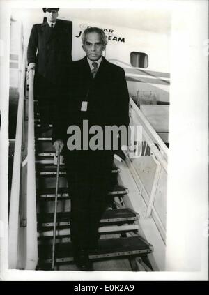 Dec. 12, 1957 - Krishna Menon Arrives At London Airport - On Way From New York to India; Among the arrivals at London Airport this morning was Krishna Menon - who is travelling from New York. He leaves London again tomorrow morning to continue his journey home to India. Photo Shows Krishna Menon on arrival at London Airport today. Stock Photo