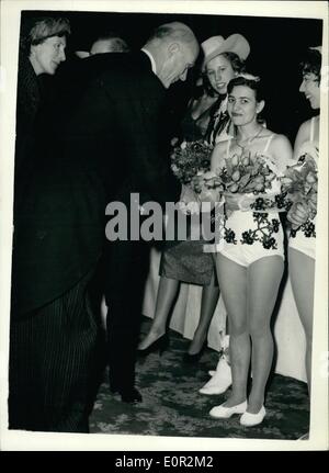 Dec. 12, 1957 - The Lord Mayor Meets Circus Artistes. The Lord Mayor of London, Sir Denis. Truscott, chatting to a small trapese artist - at Olympia where the Bartra Hills Circus opens today