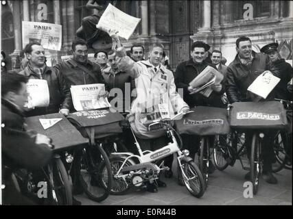 Jan. 15, 1958 - Motor Bike For Billy Bevan American Newpaper Boy Messenger: Winner of a tour around the world, 14-year-old american newspaper messenger, Billy Bevan, employed at the ''Minneapolis star and tribune'' was received at the Paris town hall today. He is seen here with some of the Paris news messengers who presented him with a motor bike. Stock Photo