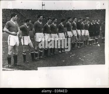 Feb. 02, 1958 - The tragedy of Manchester United Football team. About to start their watch with red star - Belgrade.: Photo shows members of the ill-fated Manchester United Football team lines up on the pitch immediately before start of their aton with red Star - in Belgrade on Wednesday. It was on returning to Manchester from this match that the BEA aircraft carrying them crashed in Munich - resulting in the deaths of 21 passengers - many of them team members - and and injuries to - others. Stock Photo