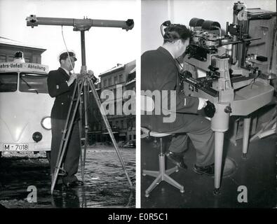 Mar. 03, 1958 - Police probing 3-dimensional photography. Since a few weeks, the Munich traffic accident police is trying out an apparatus for taking up an accident, produced in Switzerland. This apparatus is very similar to the Flak of the II World War. By means of another apparatus, the accident situation will be shown on a plane in the office of the accident police. The Munich police hopes to get a great help with this apparatus. Our picture shows:- Left side the apparatus for taking the pictures and on the right side the apparatus, which works out the pictures of the other one. Stock Photo