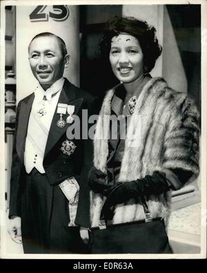 Jun. 06, 1958 - New Thailand Ambassador Presents Credentials: M.L. Peekdhip Malakul, the new Thailand Ambassador, today presented his credentials at Buckingham Palace. Photo Shows:- M.L. Peekdhip Malakul on the steps of the Embassy with his wife, Chanat, before leaving for the palace today. Stock Photo