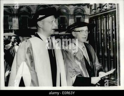 Jun. 06, 1958 - Honorary degree for United Nations Chief; The secretary general of the United Nations, Mr. Dag Hammarskjold, was among those who received Honorary degrees at Cambridge University today. Photo Shows Mr. Dag Hammarskjold walks to the Senate House at Cambridge University today. The man on right with him is believed to be Lord Birkett, who also received an honorary degree. Stock Photo