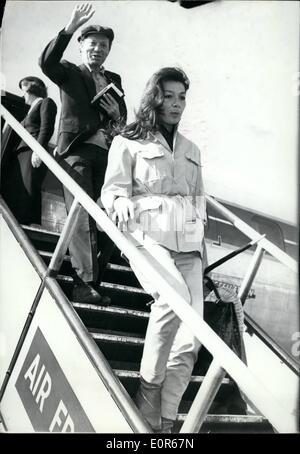 Apr. 04, 1958 - Juliette Greco: Back from Africa: Juliette Greco who is starring in ''Racines Du Ciel'' (The Roots of Heaven) just completed in Equatorial Africa arrived at Orly Airport this morning. Photo Shows Juliette going down the gangway. Stock Photo