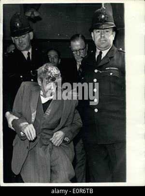 Jun. 06, 1958 - Seventy-One Year Old Hutch-Back Accused of the Murdered of Year Child - A army, of about 200 booed and shouted when TOM LIONEL BURIS, a 71 year old hunch-back left the Barrow,- in-fureass Magistrate's Court on Saturday after he had been charged with the murder of five year old LAVILIA MURRAY . Burns was driven to Walton Jail, Liverpool on remind until June 23rd.. lavinia and five year old SHEIIA BARICS wore found dead in a bedroom at Burn's, house at York Street, Barrow - the court was told KEYSTONE PHOTO SNOWS:- Tom Lionel Burns - Essorted by Police Stock Photo