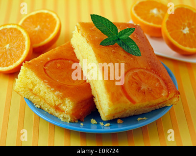 Orange sponge cake. Recipe available. Stock Photo