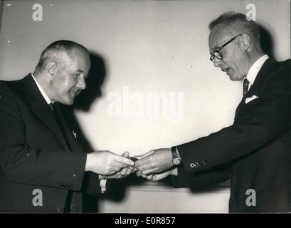 Jul. 07, 1958 - Biologists Receive Darwin medal : British and foreign botanists and Zoologists nominated for the award of a silver Darwin - Wallace commemorative medal in recognition of their outstanding contribution to the knowledge of evolution, were presented with the medal at a meeting of the Linnean society, at the Royal geographical society today. photo shows Professor Dr. Carl Rudolf Florin receives his medal this afternoon. Stock Photo