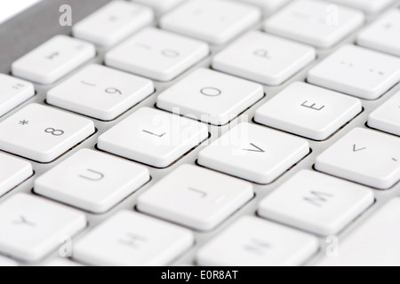 Apple mac white Keyboard spelling out the word LOVE Stock Photo