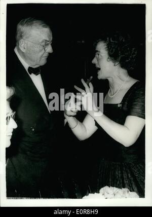 Jul. 07, 1958 - Denmark's female secretary of church enjoys a cigar: Mrs. Bodil Koch, Denmark's female Secretary of Church, enjoys a good after dinner cigar, and John Foster Dulles, the U.S. Secretary of State, during the dinner in Copenhagen last night which was attended by delegates to the NATO conference. Stock Photo