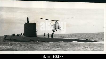 Aug. 08, 1958 - Britain Welcomes The Nautilus. The United States nuclear-powered submarine Nautilus was given a big welcome, when she arrived at Portland Harbour, Dorset - her first port of call following her historic voyage which took her under the North Pole. Keystone Photo Shows: The submarine's captain, Commander Bill Anderson, jumps aboard the Nautilus from a helicopter, off Portland. Stock Photo