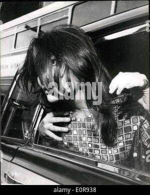 Aug. 15, 1958 - The French Film Star - with Untidy Hair. Juliette Grecro in London: Among the arrivals in London yesterday was French Film star Juliette Greco for preparations for the filming of Whirlpool which stars on Location in Germany next month. Photo shows Juliette Greco with her hair untidily over her face on arrival in London yesterday. Stock Photo