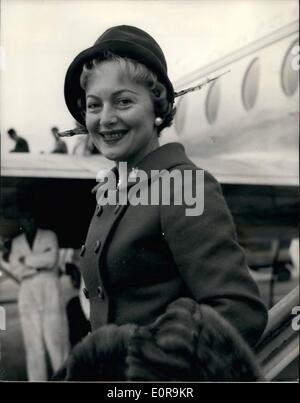 Sep. 09, 1958 - Miss Olivia De Havilland Arrives In London From Paris For The Premiere Of Her Film: Miss Olivia De Havilland, the famous film star, flew into London Airport today from Paris, She is here to attend the premiere of her latest film, ''The Proud Rebel'' in which she co-stars with Alan Ladd, and which will be shown at the Empire Theatre, Leicester Square on Wednesday next Sept. 17th. Photo Shows Miss Olivia De Havilland pictured on her arrival at London Airport this afternoon. Stock Photo