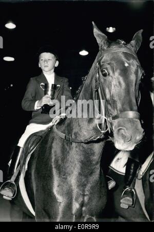 Oct. 16, 1958 - Ten-Year-old School Boy Wins Riding Event: Ten-year-old French school Boy, Eric Fraissinet, won the Cadets cup at the international riding Event which opened at Thepalais des sports, Paris, Today. Photo shows Little Eric With his Trophy. Stock Photo