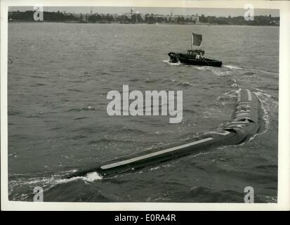 Sep. 09, 1958 - Demonstration of the flexible barge. Demonstration were held today at Southampton of the revolutionary flexible barge, made of nylon and synthetic rubber, containing a cargo of kerosene. The flexible barge, called Dracone , can be towed by any vessel of reasonable power, and has been developed for the transport of liquids lighter than water. When emptied the barge can be wound up on a spool. Keystone Photo Shows: The Dracone flexible barge, showing its maneuverability during today's demonstration at Southampton. Stock Photo