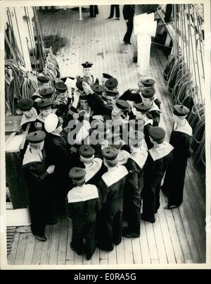 Sep. 09, 1958 - The ''Christian Radich'' visits London.:The three-masted square rigged Norwegian sailing ship ''Christian Radich'', which is one of the stars of the Cinemiracle film ''Windjammer'', now being shown in London at the Odeon Cinemiracle Theatre, sailed up the Thames today from Gravesend, to berth at the West India Docks, for four days, during which time Londoners will be allowed aboard.The Ship is manned by 74 cadets with Captain Kjell in command. Photo shows cadets aboard the Chritian Radich gather round for their mail at Gravesend today before sailing up to London. Stock Photo