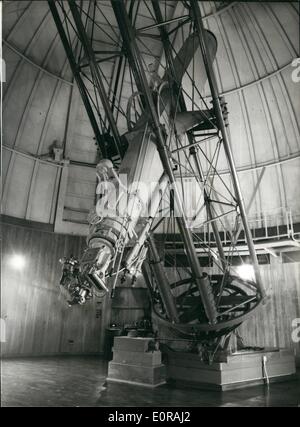Nov. 11, 1958 - The New Royal Greenwich Observatory - Herstmonceux Castle - Sussex. Giant telescope which were mounted at Greenwich have been re-erected at ''Dome Town'' Herstmonceux Castle, Sussex.. The move has been going on for years - and is now complete.. The famous castle is used for administrative offices - labs - and library.. The telescope are housed in the specially constructed domes built in the castle grounds. Keystone Photo Shows:- View inside one of the domes showing a huge 28'' equatorial telescope at the new Greenwich Observatory. Stock Photo