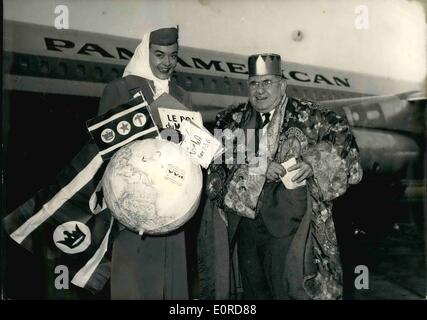 Feb. 02, 1959 - King of the world. Homer Tomlison, a New York priest, claims he has received a divine message telling him he is to be crowned King of All Nations. The 66-year old Monsignor arrived in Paris today and proclaimed himself King of Paris. He will then proceed to other countries will proclaimed himself King at every stop. OPS: Homer Tomlinson wearing a most unusual dress on arrival at Le Bourget today. Feb. 2nd/ 59 Stock Photo