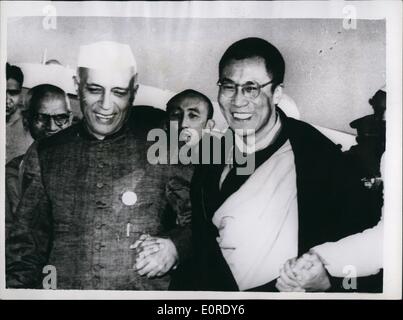 Apr. 04, 1959 - Dalai Lama enters India: Pekin Radio announced that the Dalai Lama,Tibet ''God King'' entered India today. The raio, broadcasting a report by the New China News Agency, said the Dalai Lama was accompanied by a group of Tibetian Anti-Communist rebels. Photo shows Dalai Lama (right), with the Indian Premier, Mr.Nehru, when the Dalai Lama arrived in Delhi in December 1956, to attend the 2,500th anniversary celebration on Buddhism. Stock Photo