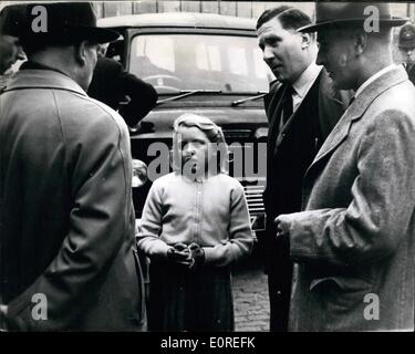 Apr. 04, 1959 - Ten-Year-old Christine sees ,000 mail bag Robbery - and tells detectives all about it: Ten-years-old Christine firm stone was skipping her way home down a narrow, cobbled back street in Marylebone yesterday when she saw five masked men ambush a post office mail van. She saw the bandits drag out the driver and his mate, and then escape in a car with three bags full of registered packets containing ,000. Then fair-haired Christine told detectives all about it Stock Photo