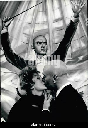 Apr. 04, 1959 - Yule Brynner Films in Paris: The famous American actor is in Paris now for the filming of ''Once more with feeling'', produced and directed by Stanley Donen. IN this film, Yul Brynner plays the part of a Conductor. photo shows A Scene of the film : Yul Brynner with his partner, Kay Kendall. Stock Photo