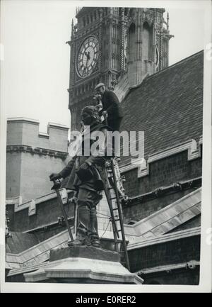 Apr. 07, 1959 - Oliver Cromwell Gets A Clean-Up: Photo shows The scene as workmen get busy cleaning up the statute of Oliver Cromwell for the Spring - outside the House of Commons this morning. Stock Photo