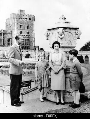 Queen Elizabeth II with her husband Prince Philip and their children sightseeing at a castle Stock Photo
